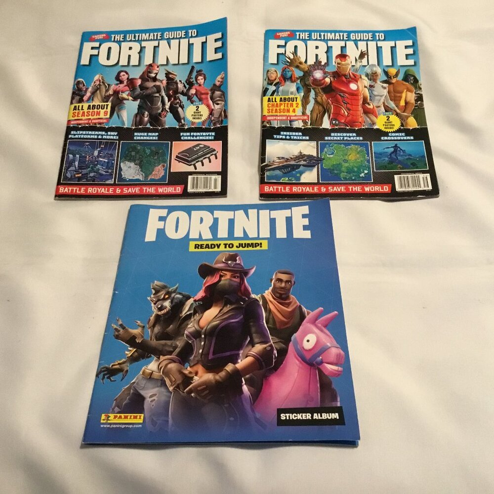 Lot of 3: 2 Ultimate Guide To Fortnite and 1 Sticker album
